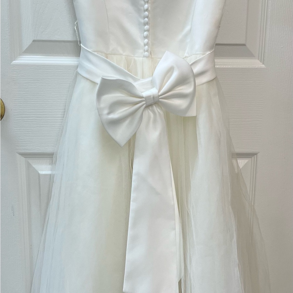 David's Bridal Satin Flower Girl Dress with Tulle Skirt 
STYLE# S1038 
Size 7 - Picture 3 of 5